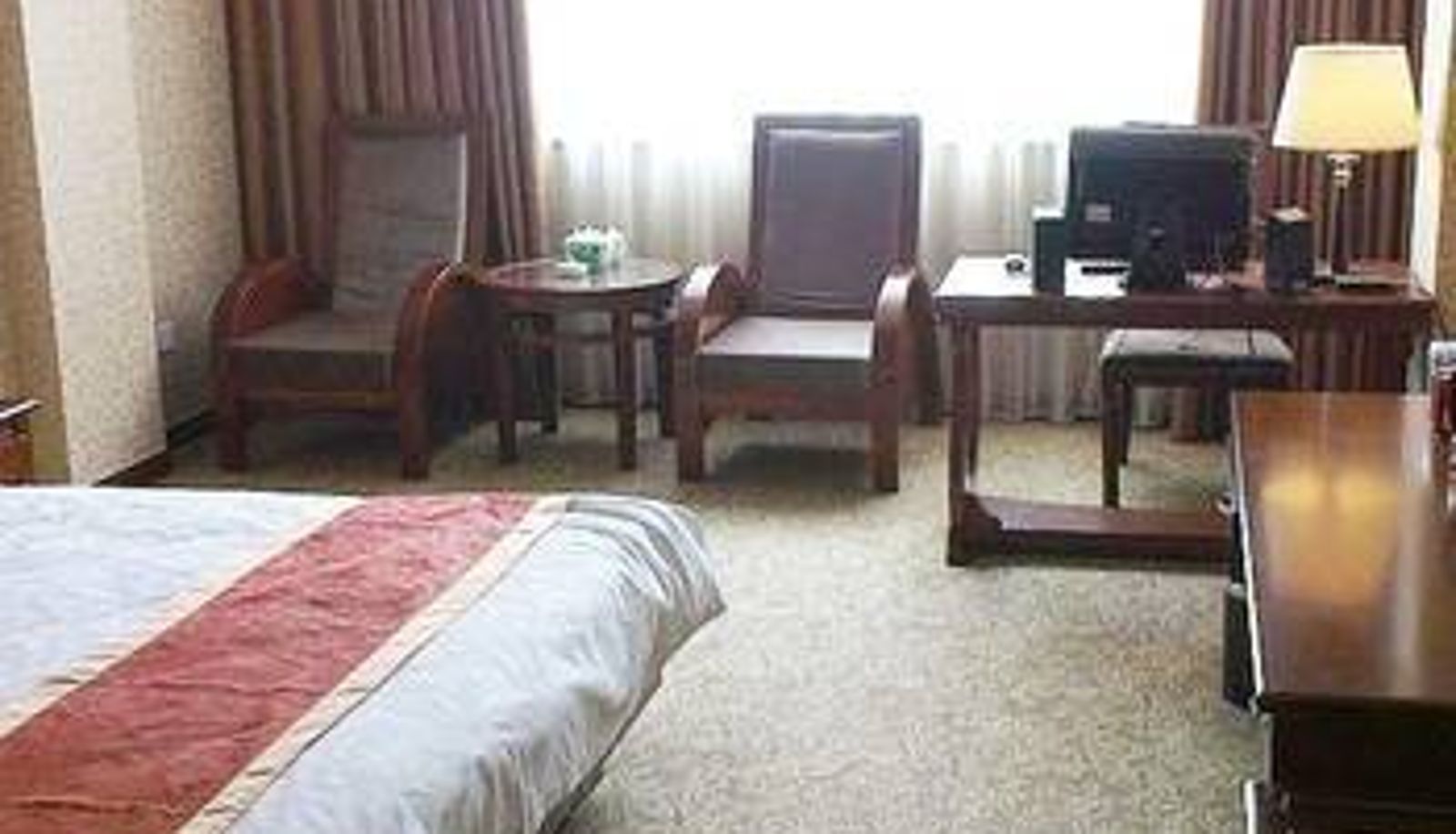 Zimmer - Kunlun Leju Hotel (Xinchen Road Qiliyuan Branch)