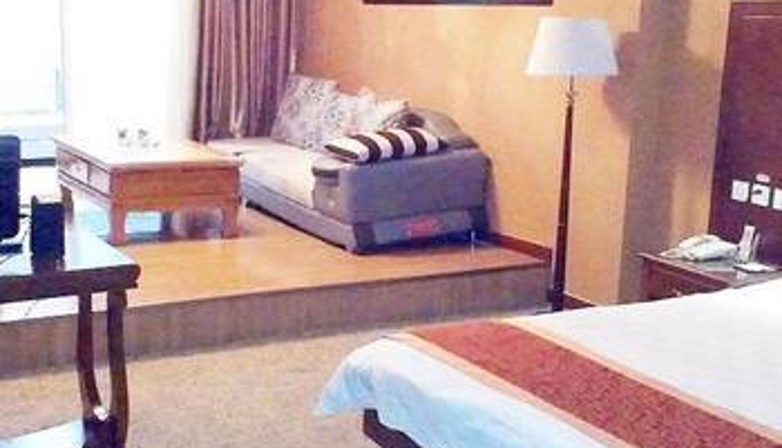 Zimmer - Kunlun Leju Hotel (Xinchen Road Qiliyuan Branch)