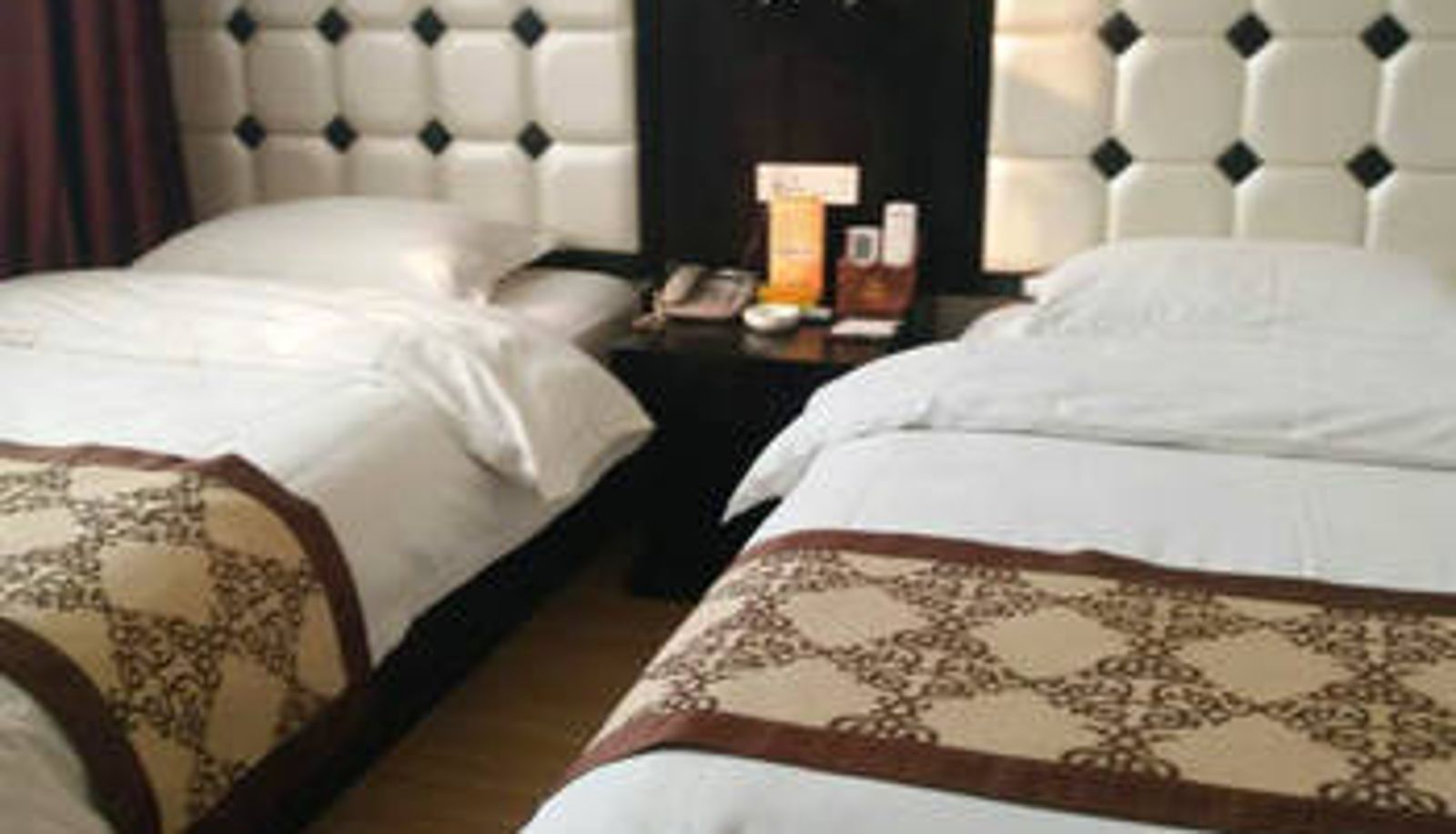 Zimmer - Heluo Sunshine Culture Theme Hotel