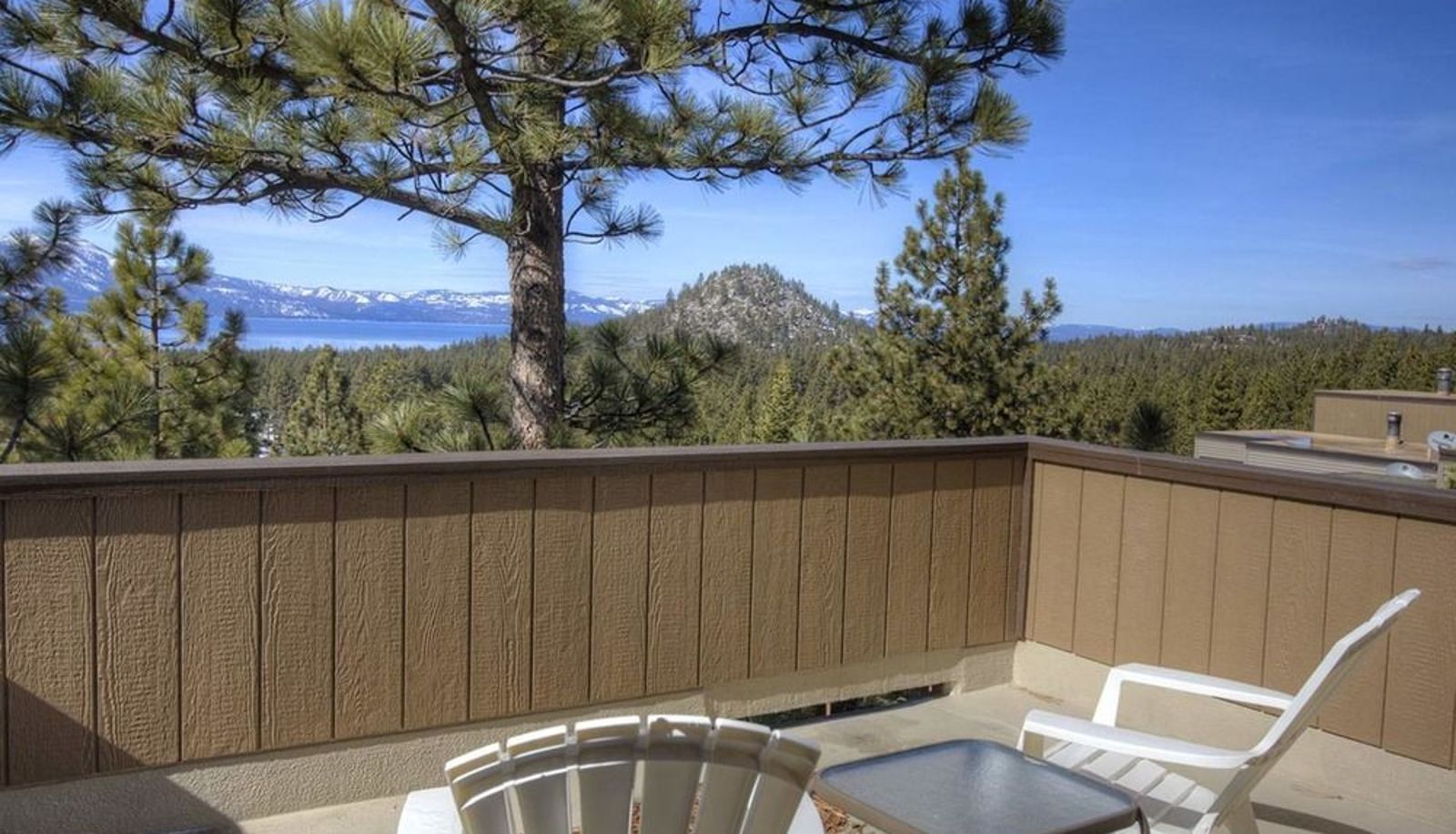 Room with balcony - Modern Lake Village with Great Views 3 Br condo by RedAwning