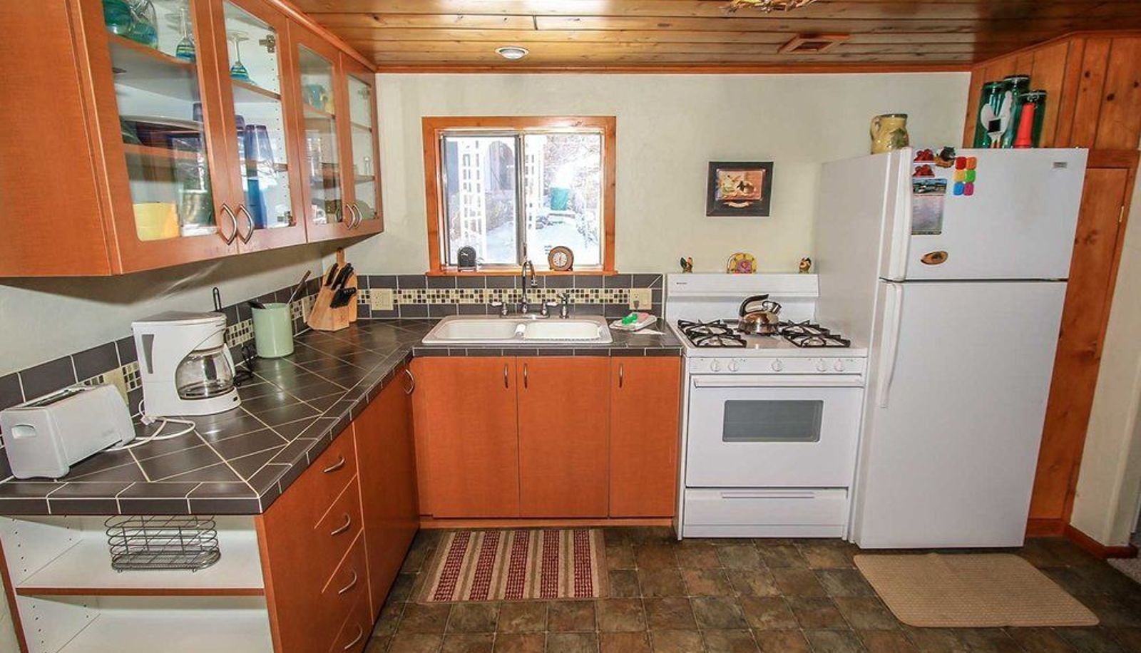 Kitchen area in the room - Merced Cottage 1453 by RedAwning