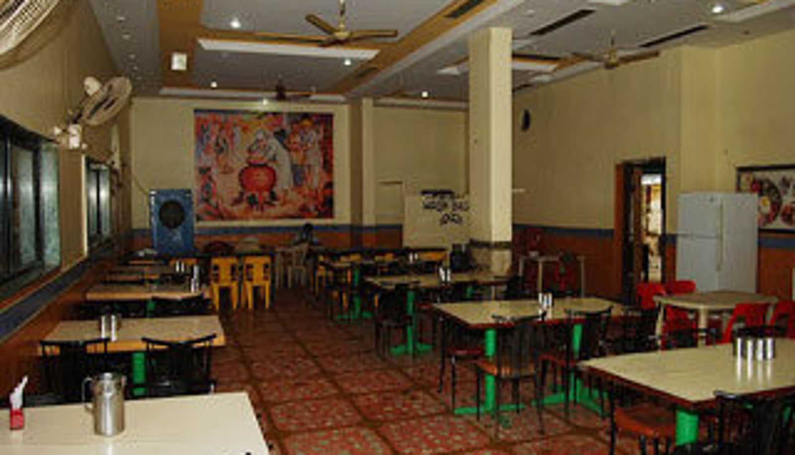 Breakfast room within the restaurant - Hotel kaustubh