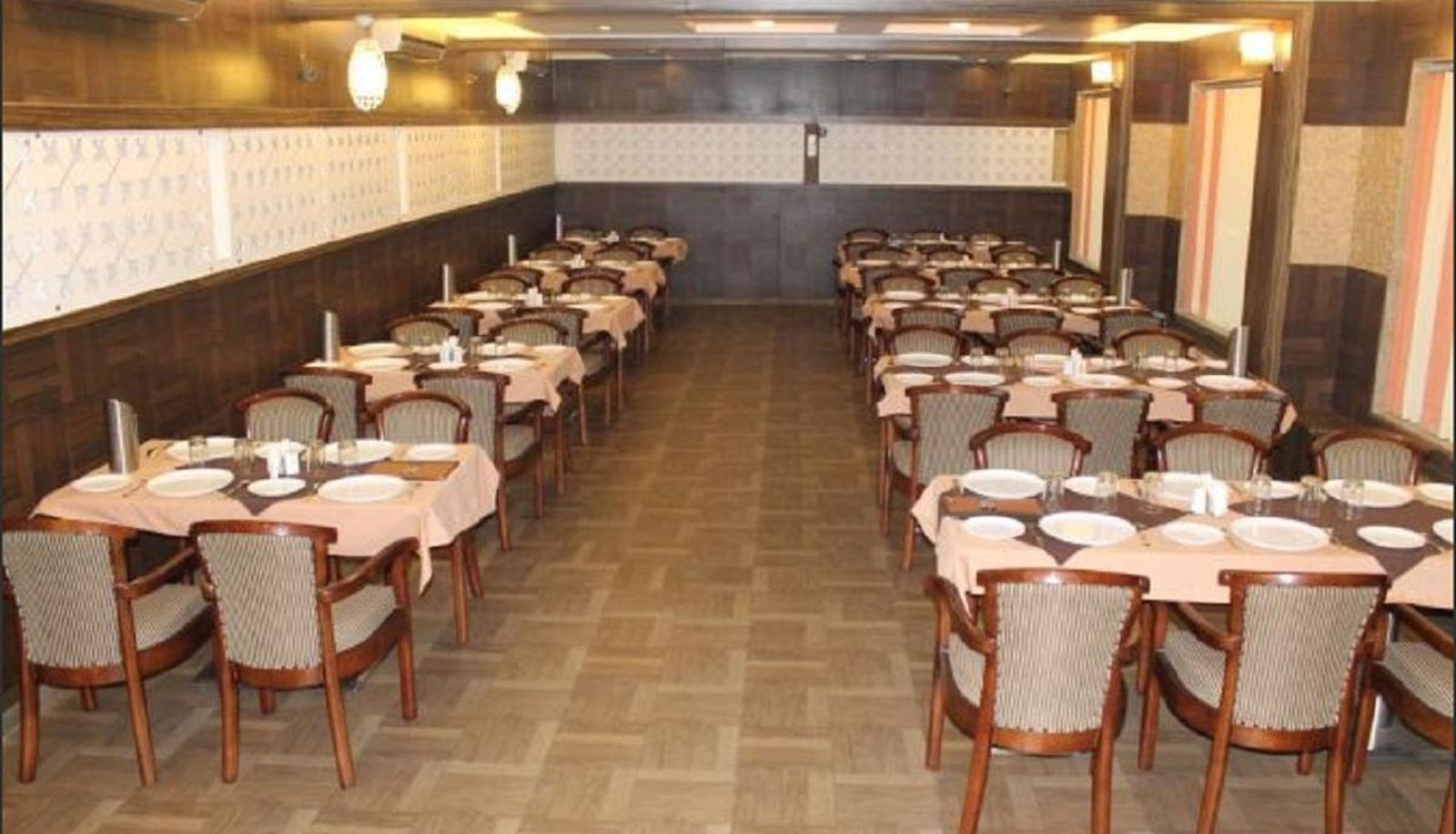 Breakfast room within the restaurant - Hotel Ganpati Palace