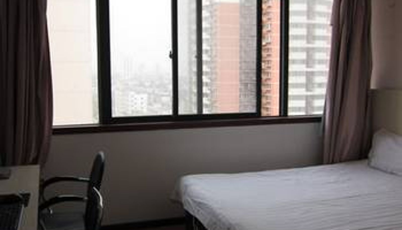 Zimmer - Luoyang White-collar Hotel