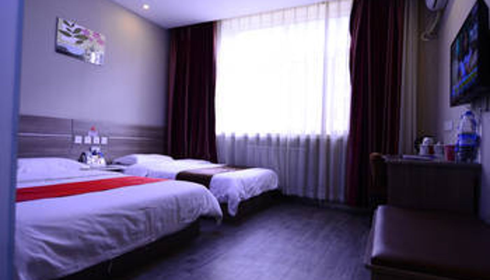 Kamer - Xinqi Chain Hotel (Huanghe West Road Second Hospital Store)