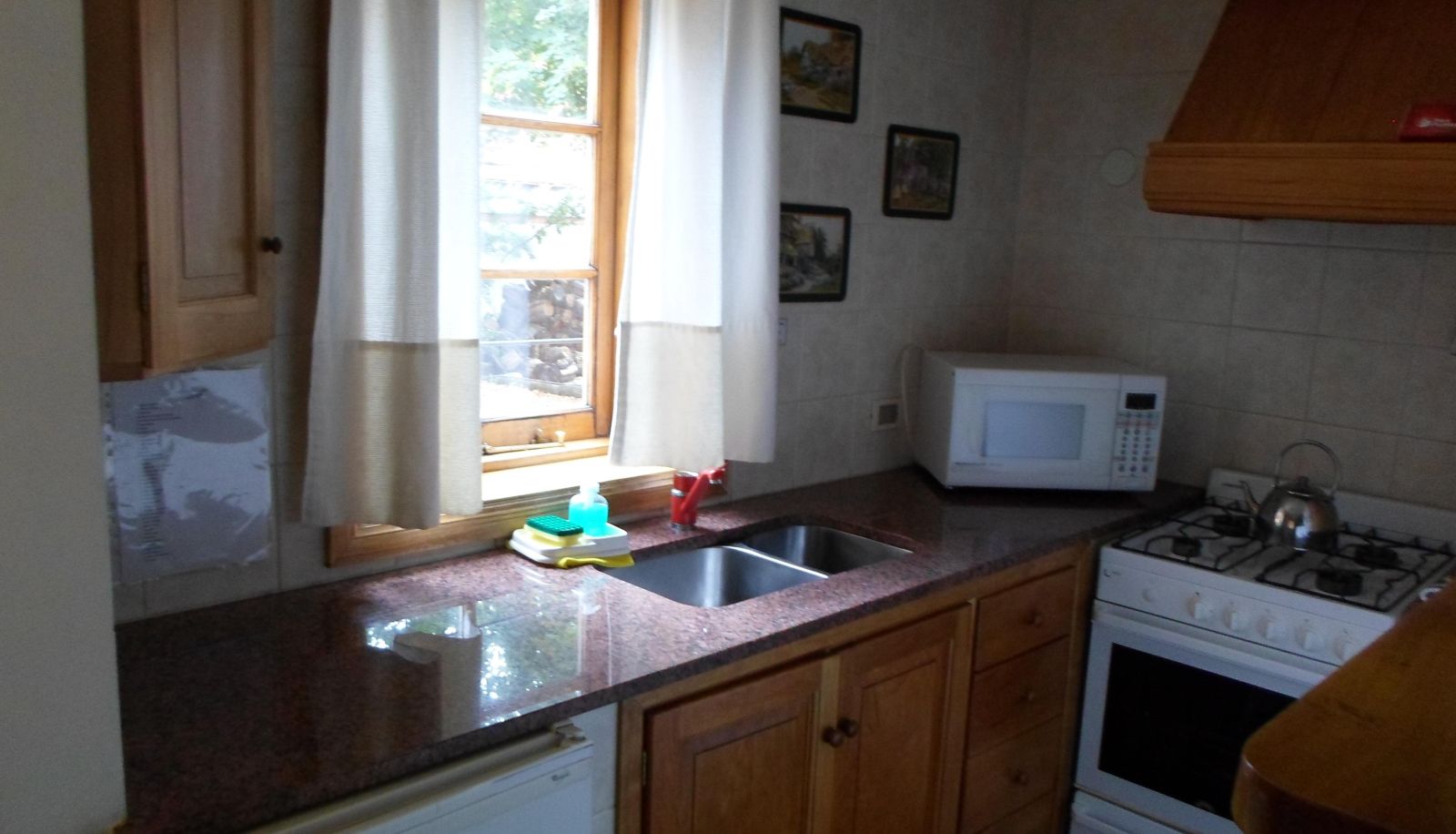 Kitchen area in the room - Apart Hotel Robles del Sur