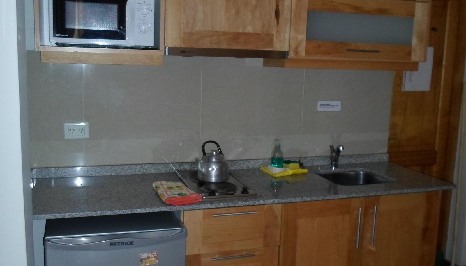 Kitchen area in the room - Apart Hotel Robles del Sur