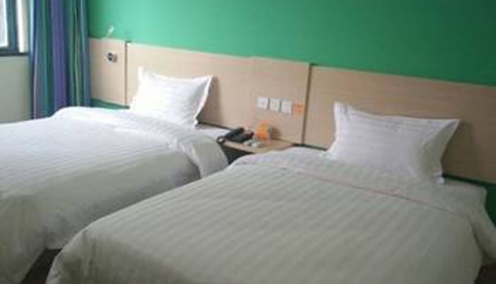 Chambre - 7 days hotel Taixing Guoqing East Road