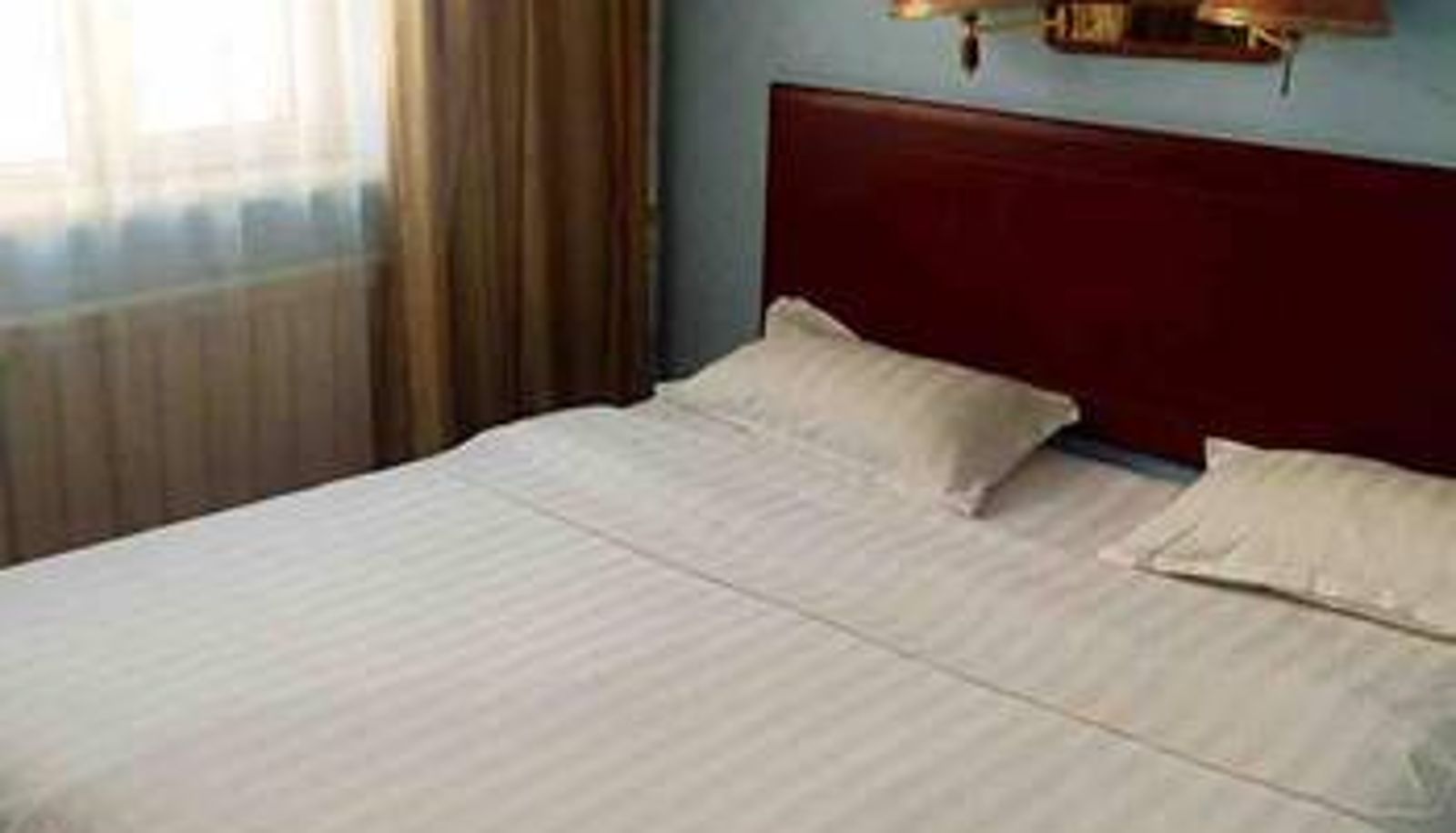 Zimmer - Guxin Business Hotel (Dazhao Branch)