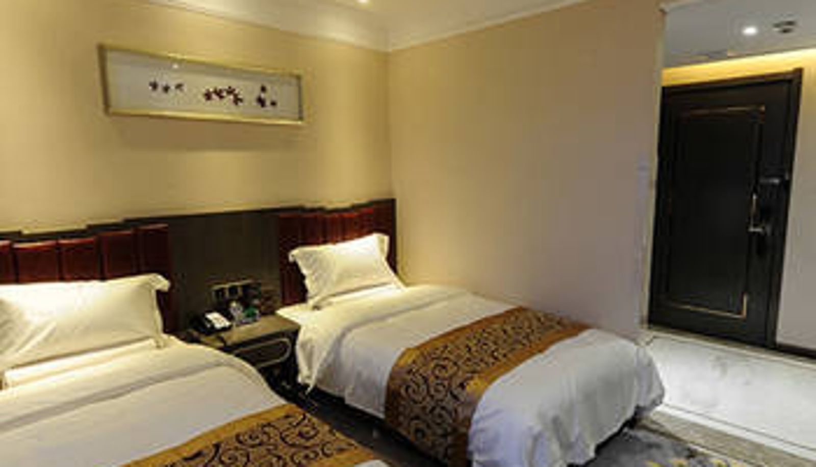Chambre - Jiatai Hotel