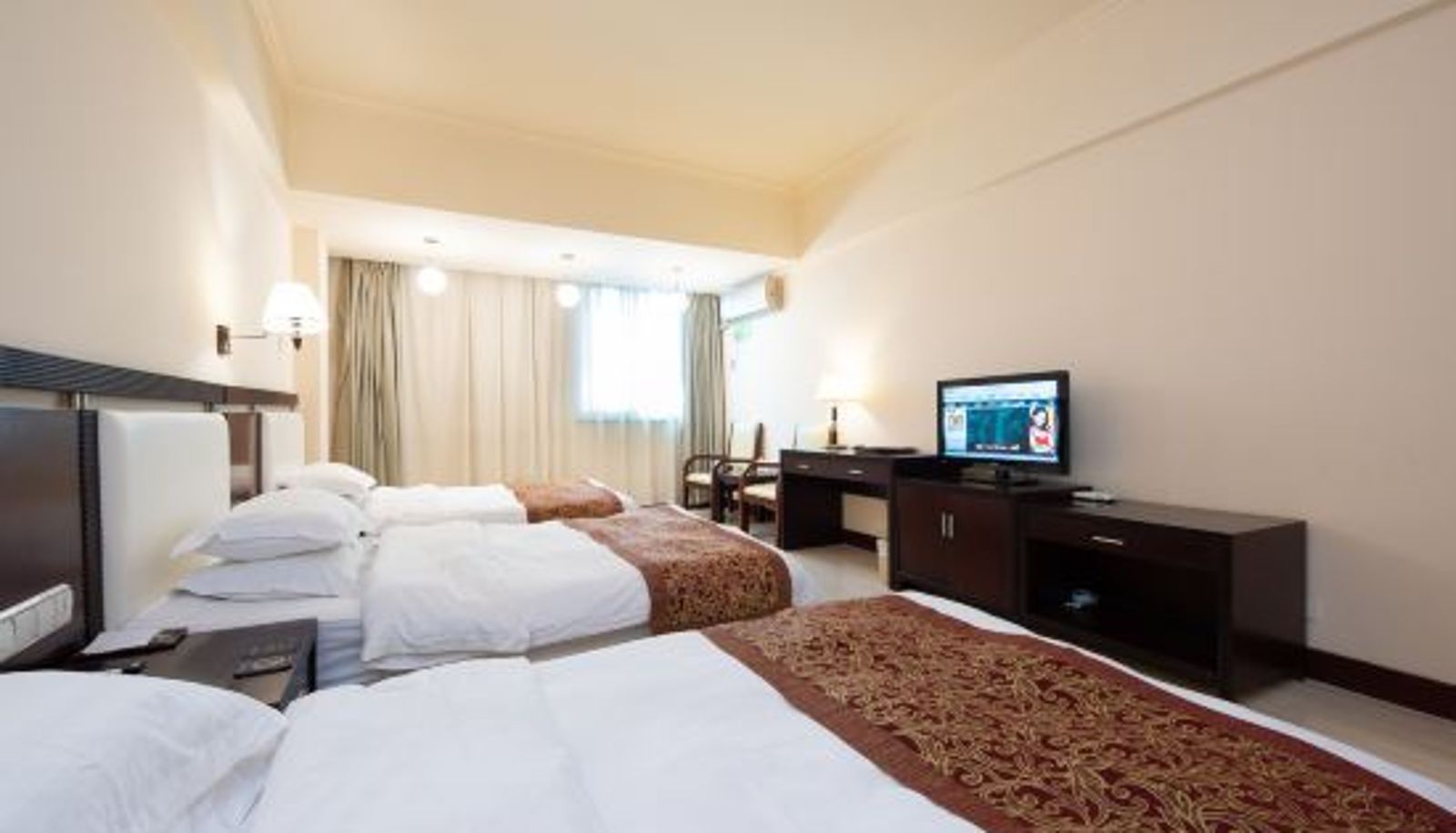 Dreibettzimmer - Taoyuan Hotel