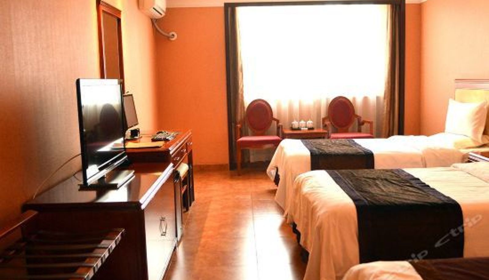 Dreibettzimmer - Sanhe Sports Hotel