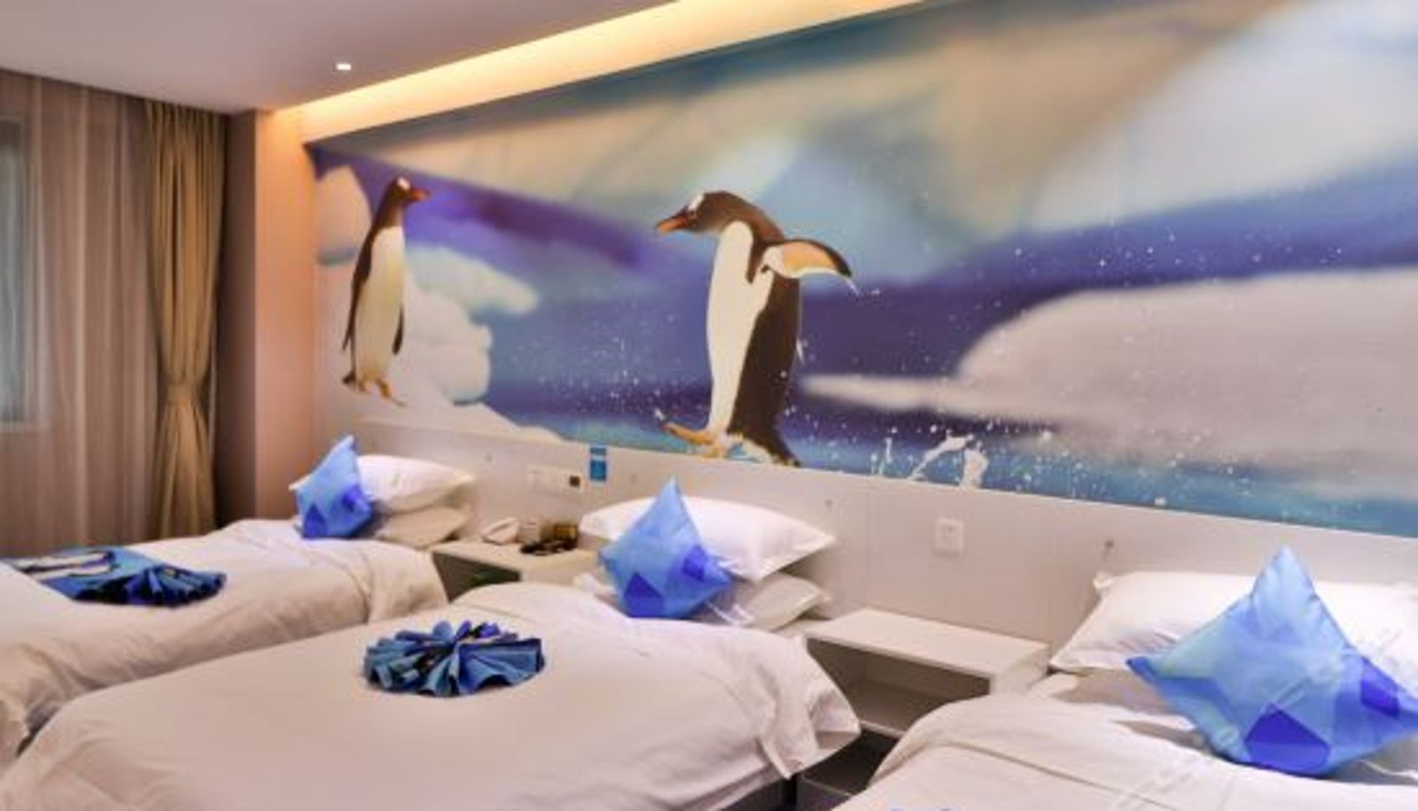 Dreibettzimmer - Penguin Hotel (Rizhao Ocean Park Dongyi Town)