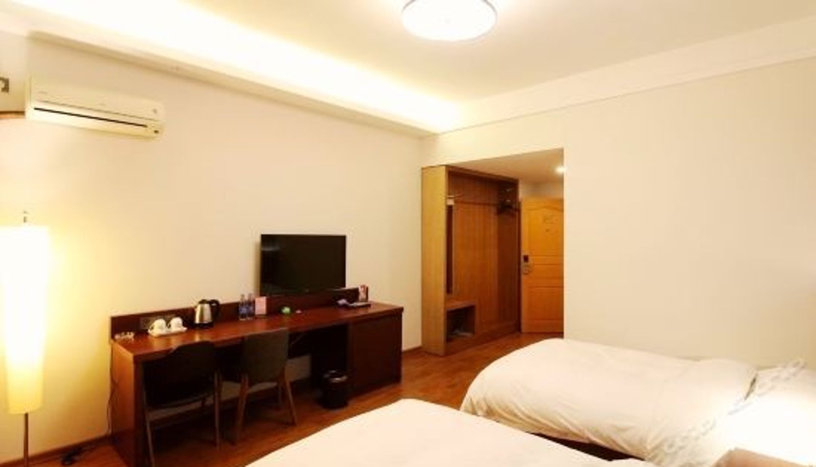 Business room - Izunco Hotel (Qingdao Badaguan)