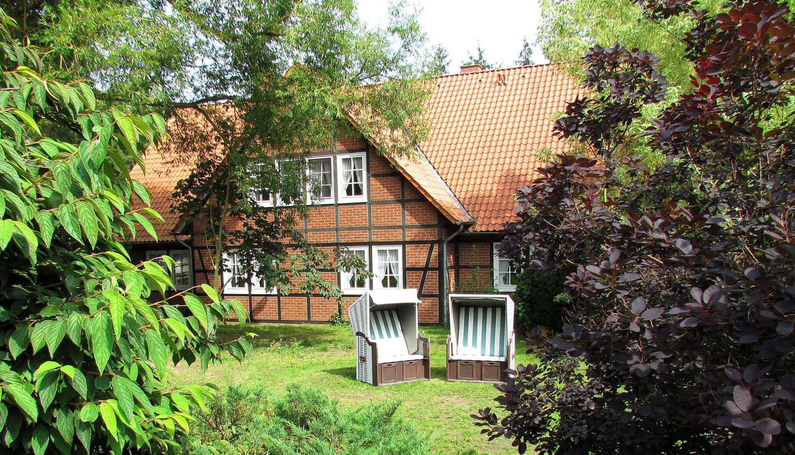 Garten - CAREA Brunnenhof Ferien- und Reitsport Hotel