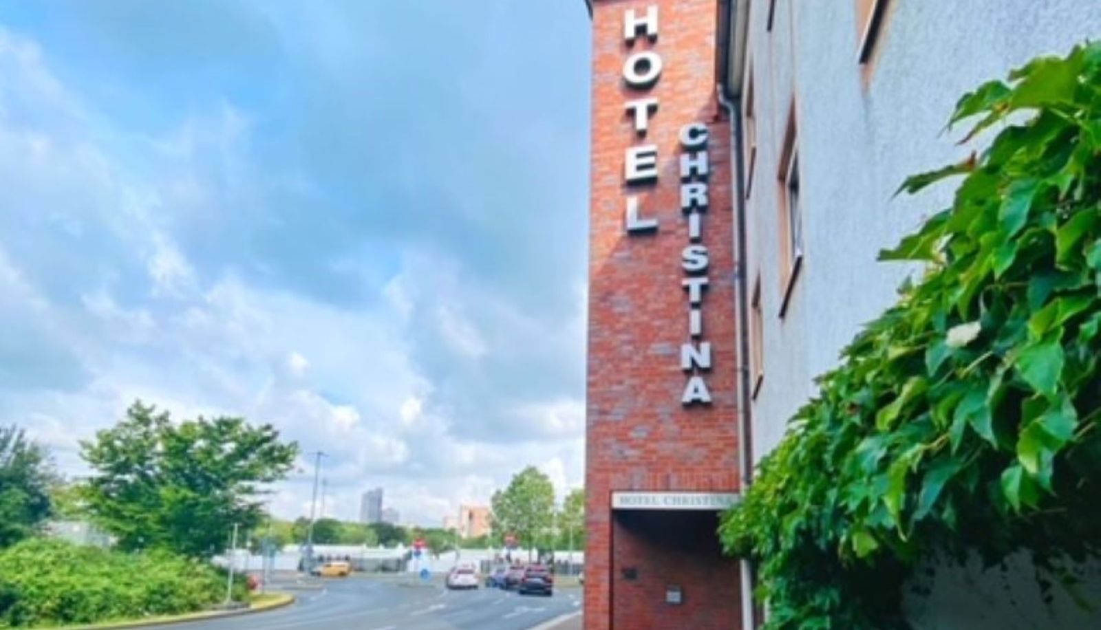 Buitenruimte van het hotel - Hotel Christina