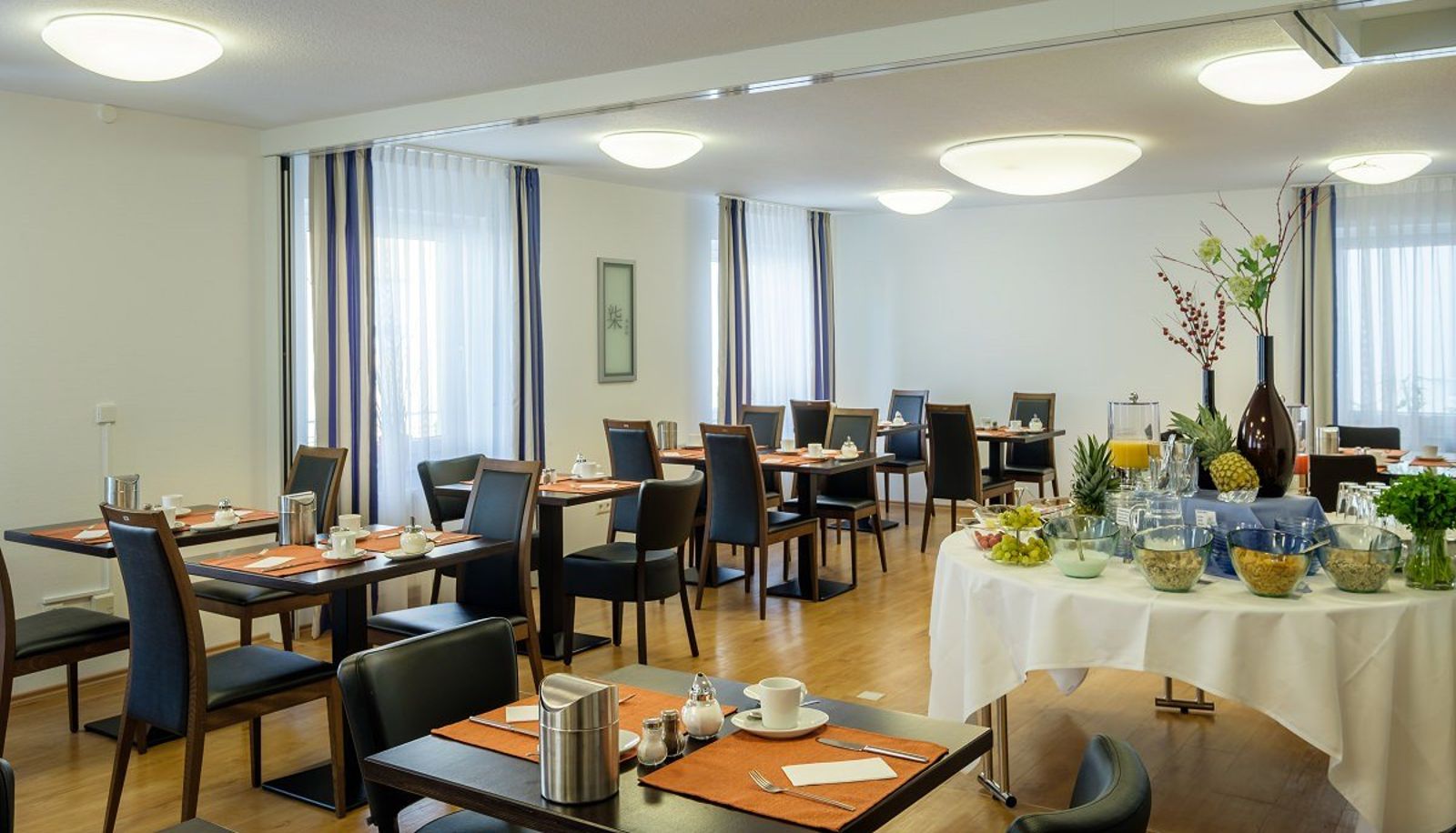 Salle de petit-déjeuner - Business Hotel Schramberg