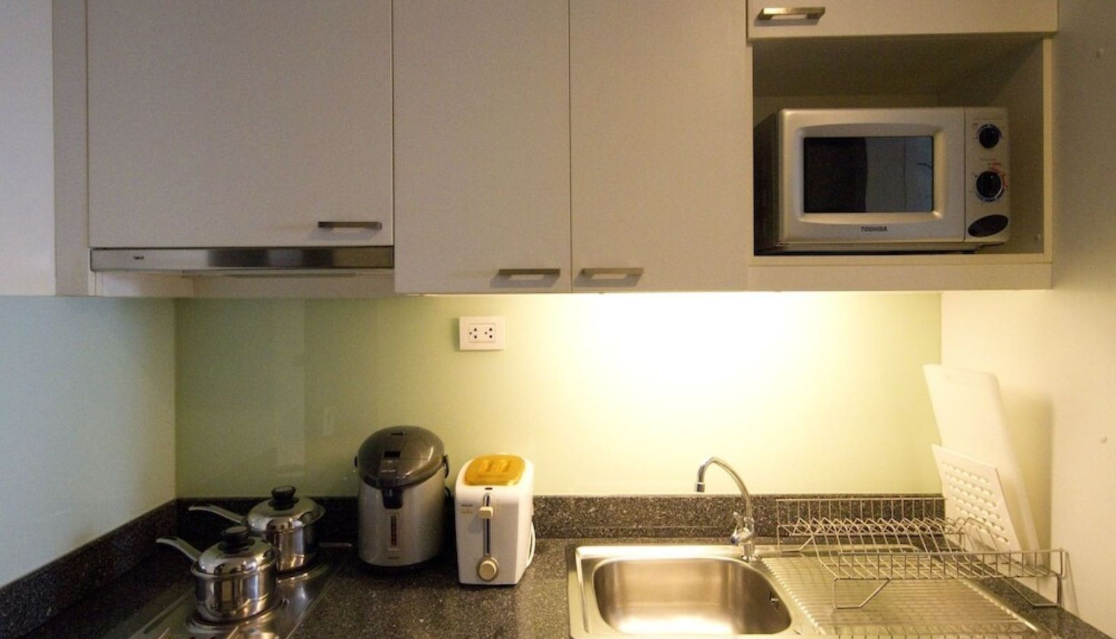 Coin cuisine dans la chambre - Cape Racha Hotel & Serviced Apartments
