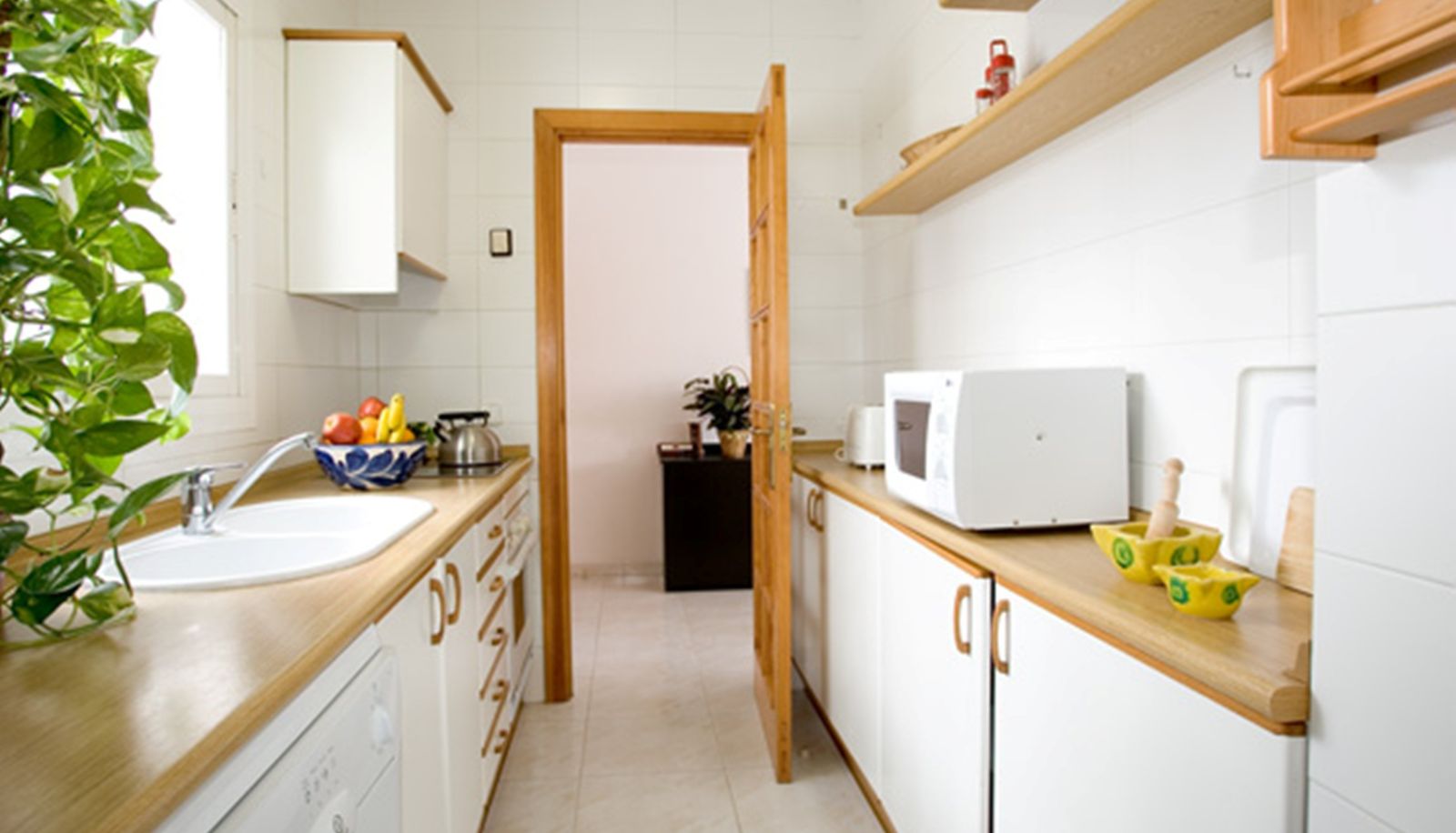 Kitchen area in the room - Apartaments Edificio Puerto