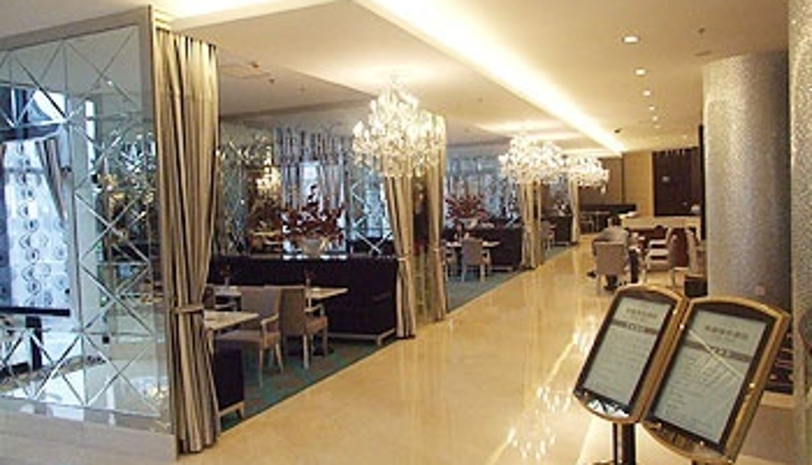 Sala de desayunos dentro del restaurante - Lotus Hotel