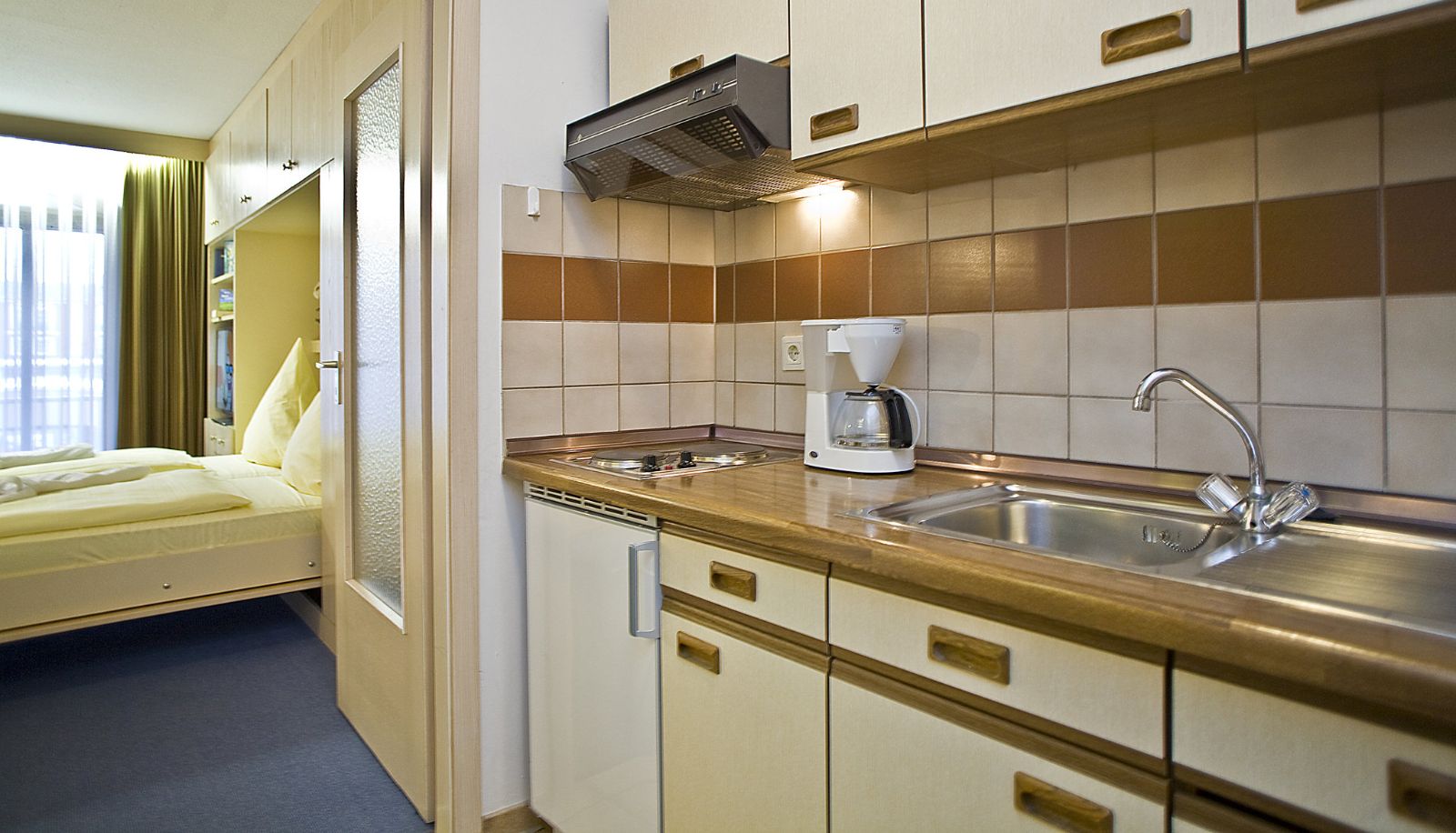 Küchenbereich im Zimmer - Thermenhof Appartementhaus