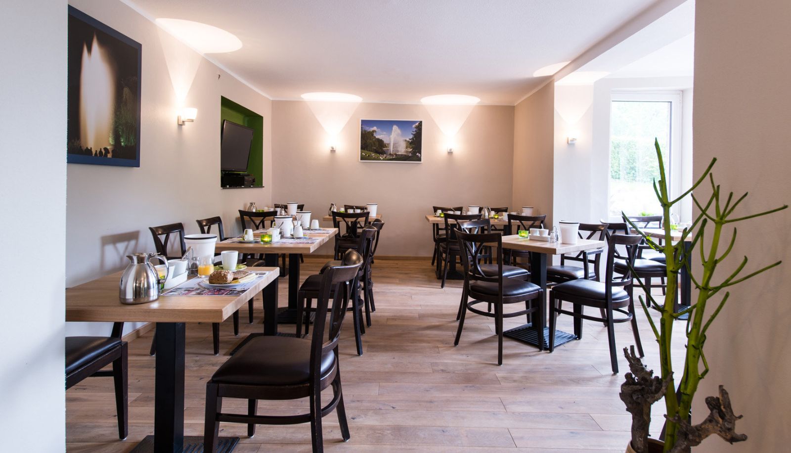Salle de petit-déjeuner - Hotel am Herkules