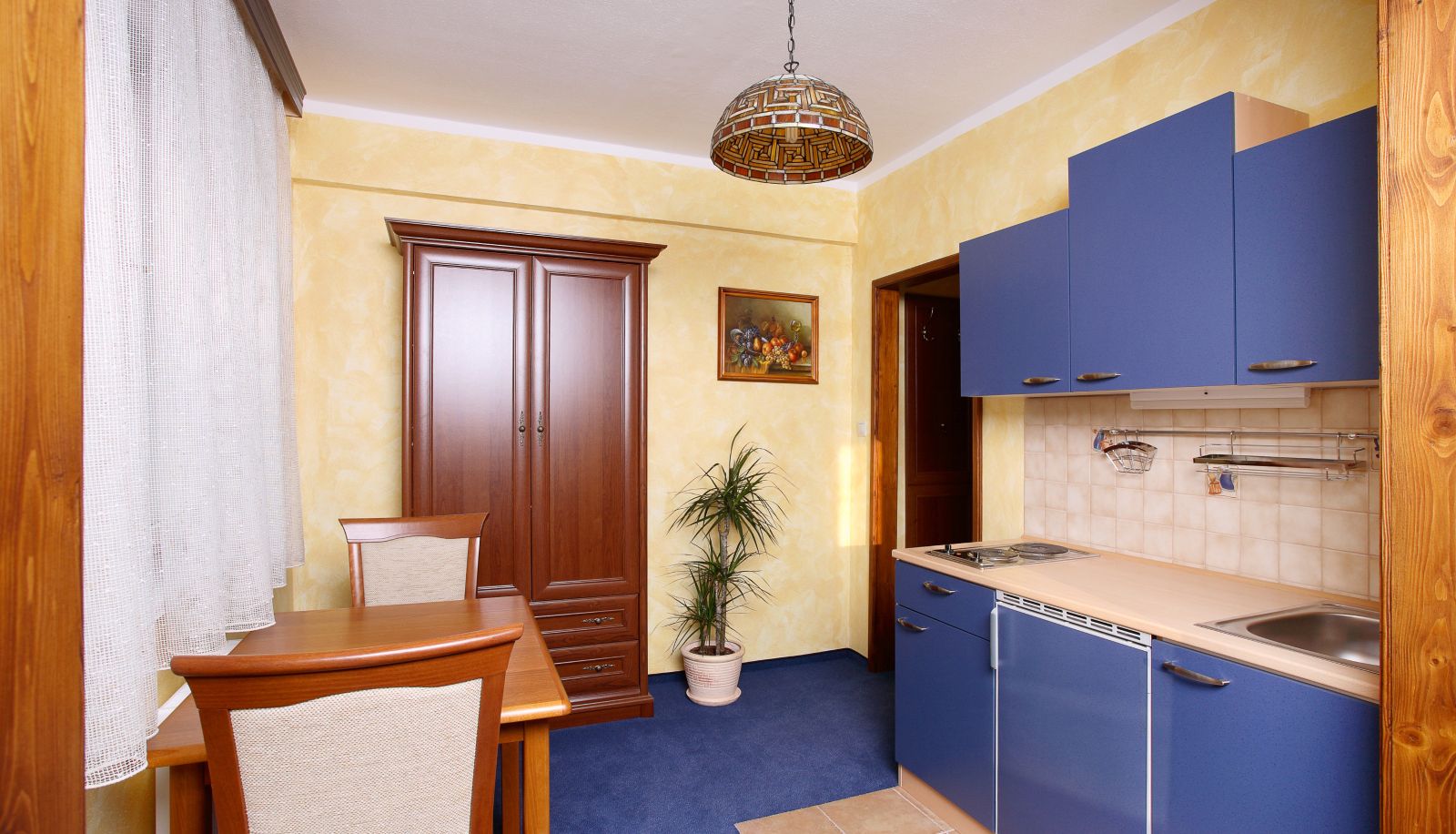 Küchenbereich im Zimmer - Penzion Aurooms