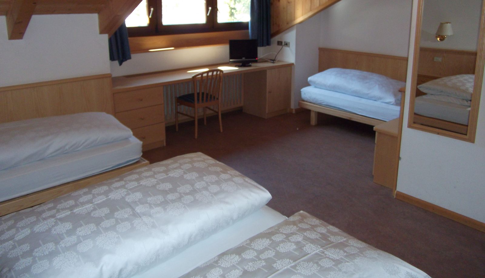 Vierbettzimmer - Alpin Haus