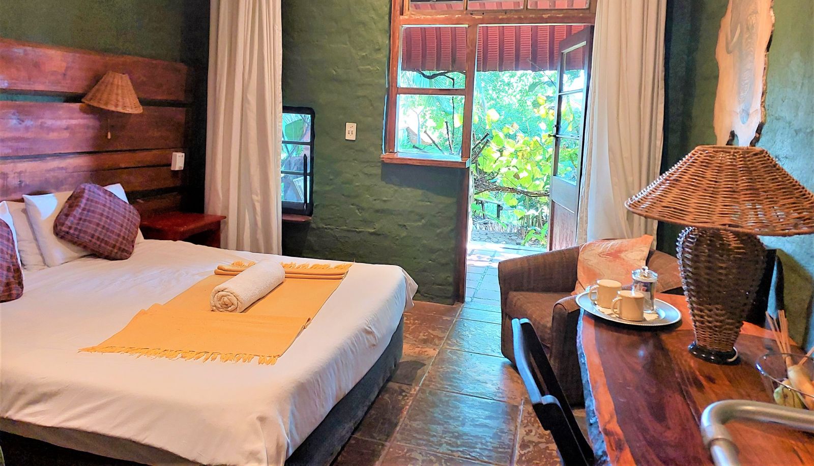 Chambre avec terrasse - River House Lodge