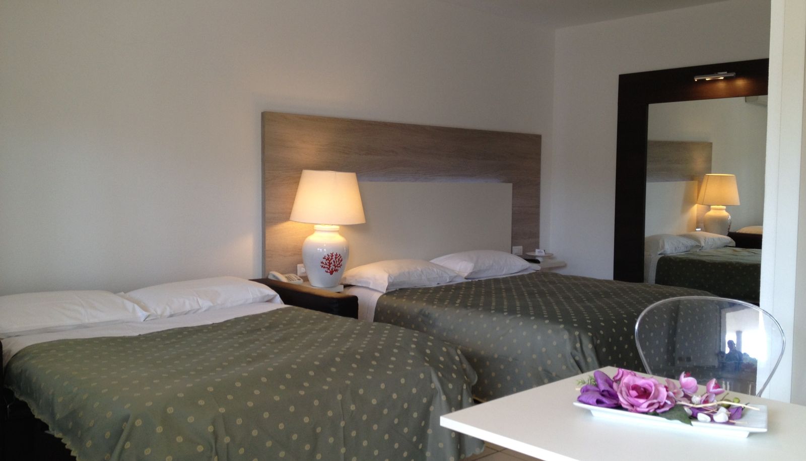 Pokój czteroosobowy - Ambrosio La Corte Fashion Hotel