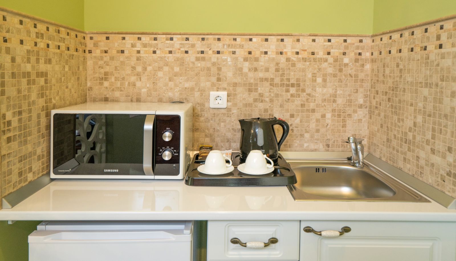 Angolo cottura in camera - Studio One Accommodation Suites