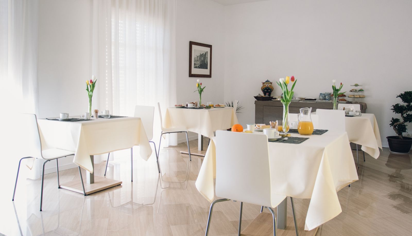 Frühstücksraum - Alludo Aparthotel B&B