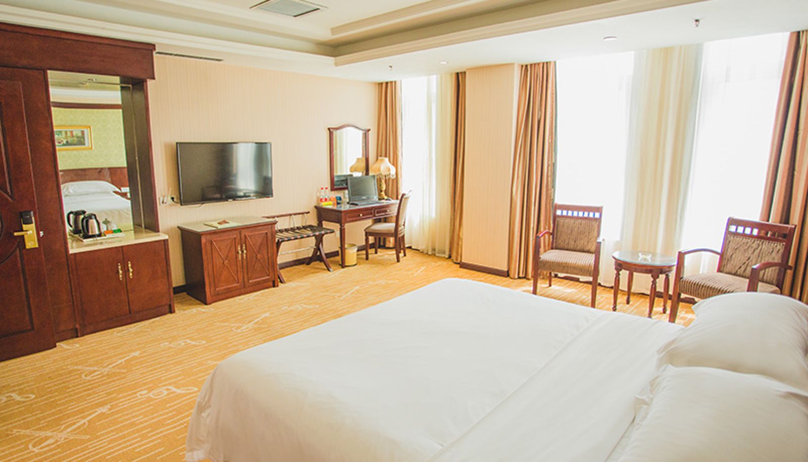 Zimmer - vienna hotel(Dongying Wanda Plaza Hotel) Dongying Wanda Plaza