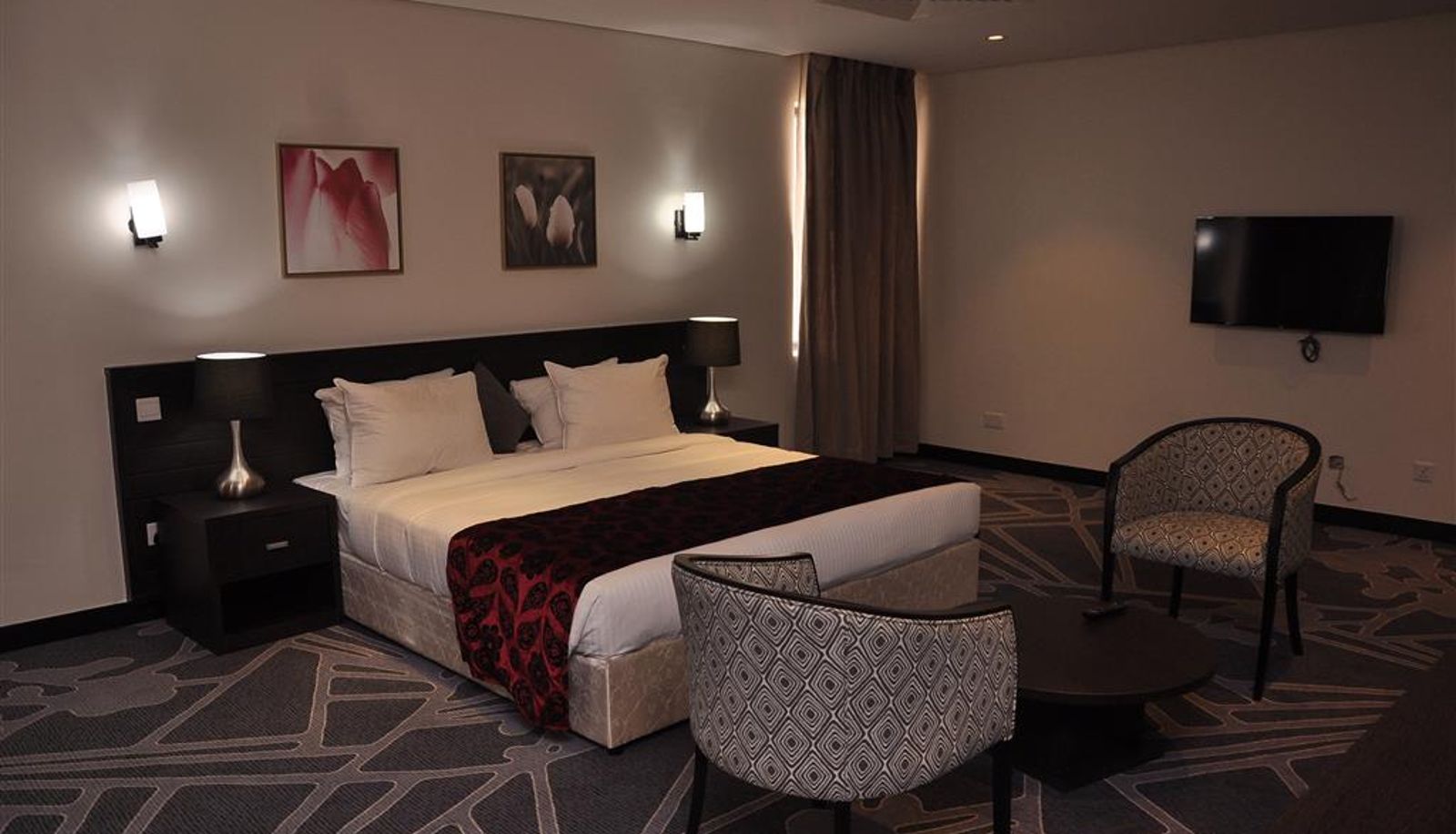 Chambre - GOLDEN TULIP ONIRU SUITES