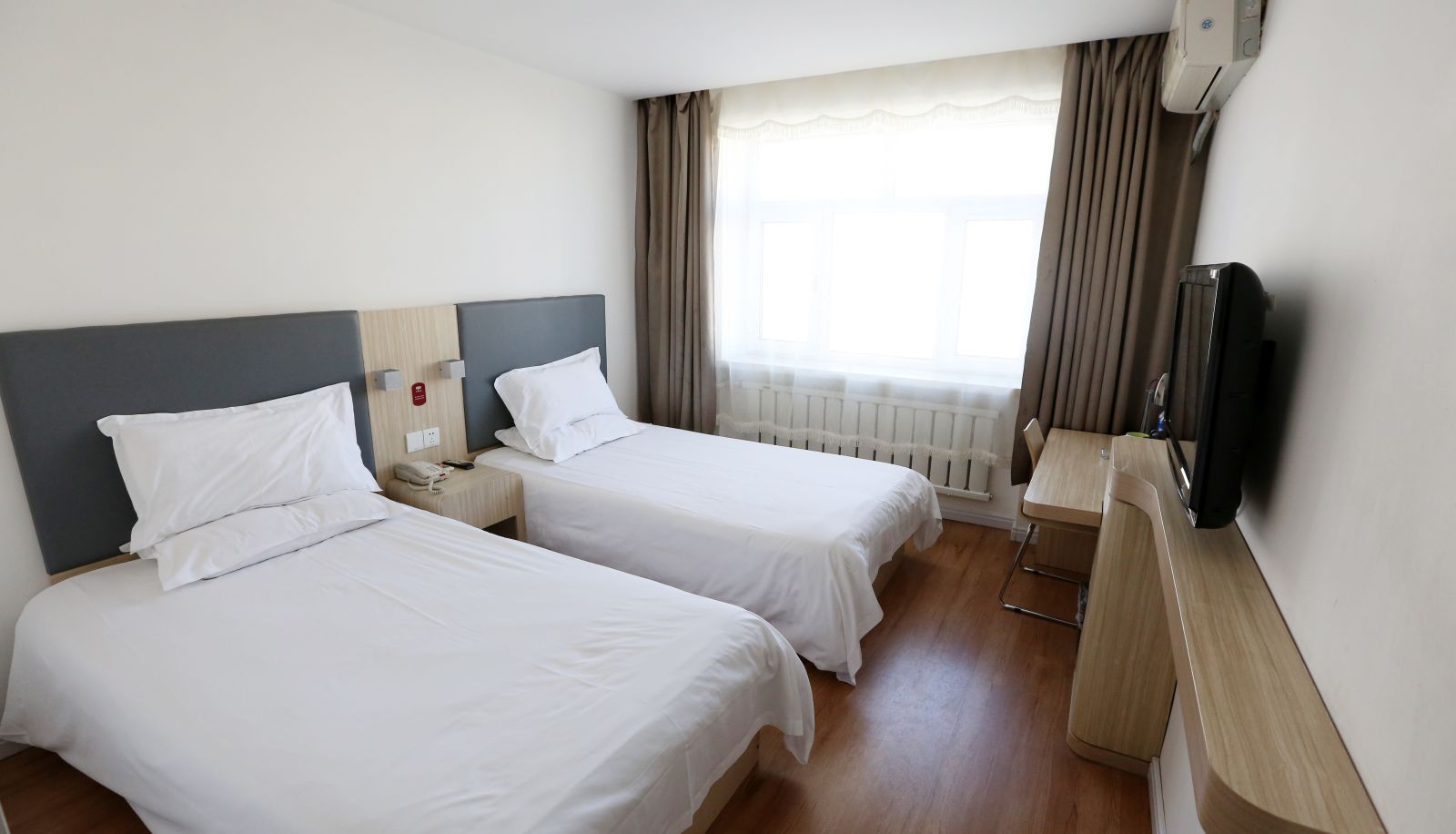 Zimmer - Yilai Jiamusi Chang'an Road Hotel