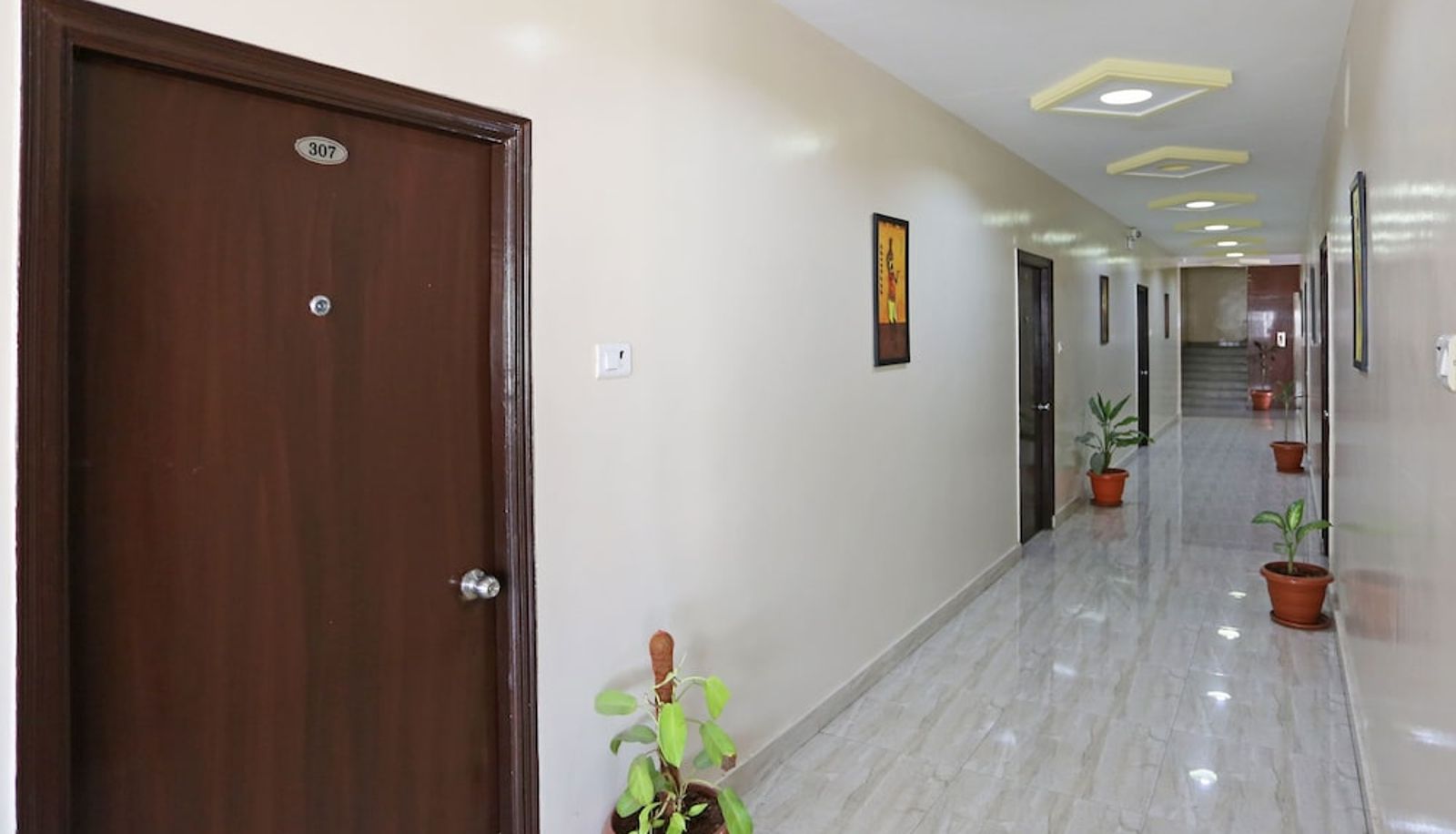 Hall - OYO 6661 Aurum Abode