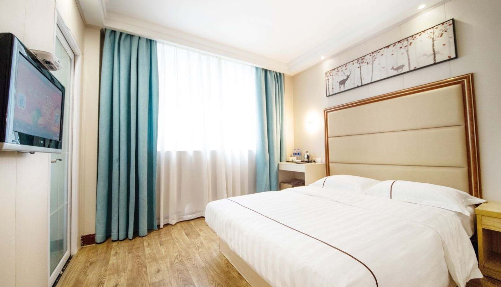 Zimmer - Yilai Xinyang railway station hotel