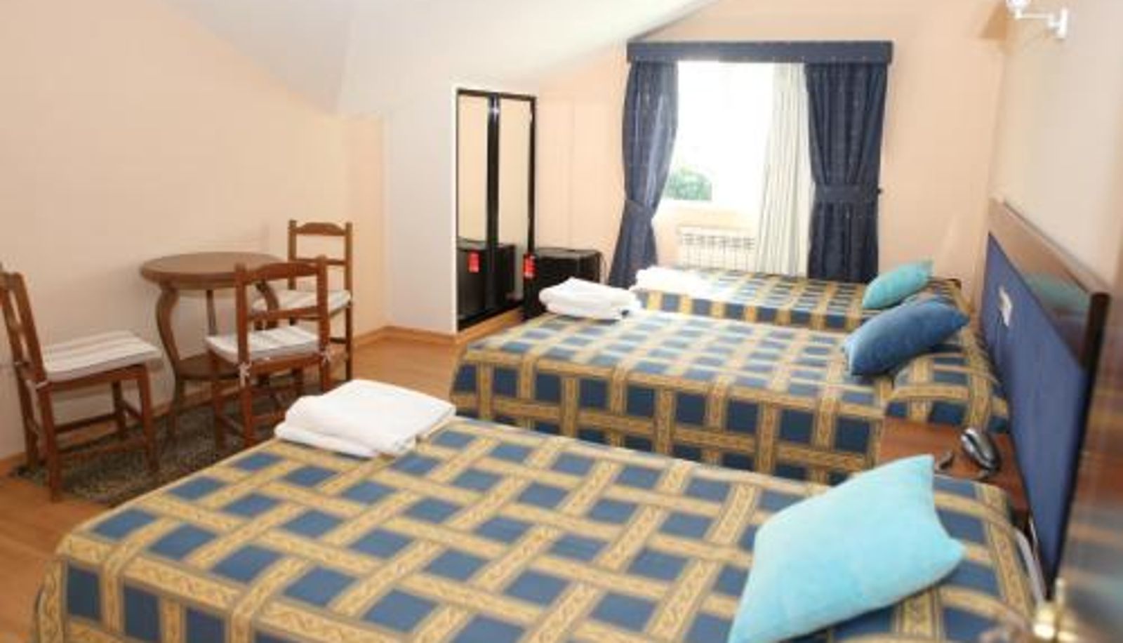 Pokój trzyosobowy - Hotel Santa Cruz