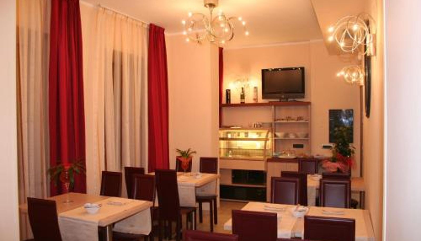 Frühstücksraum innerhalb des Restaurants - Hotel Conte Ruggero