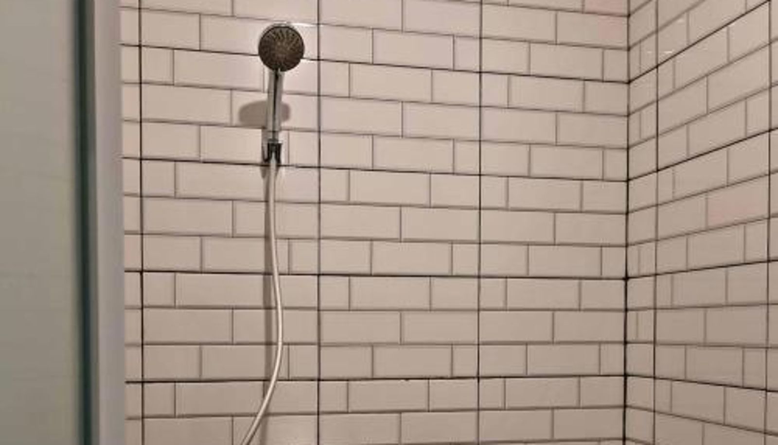 Cuarto de baño - RedDoorz at CBD Polonia Medan