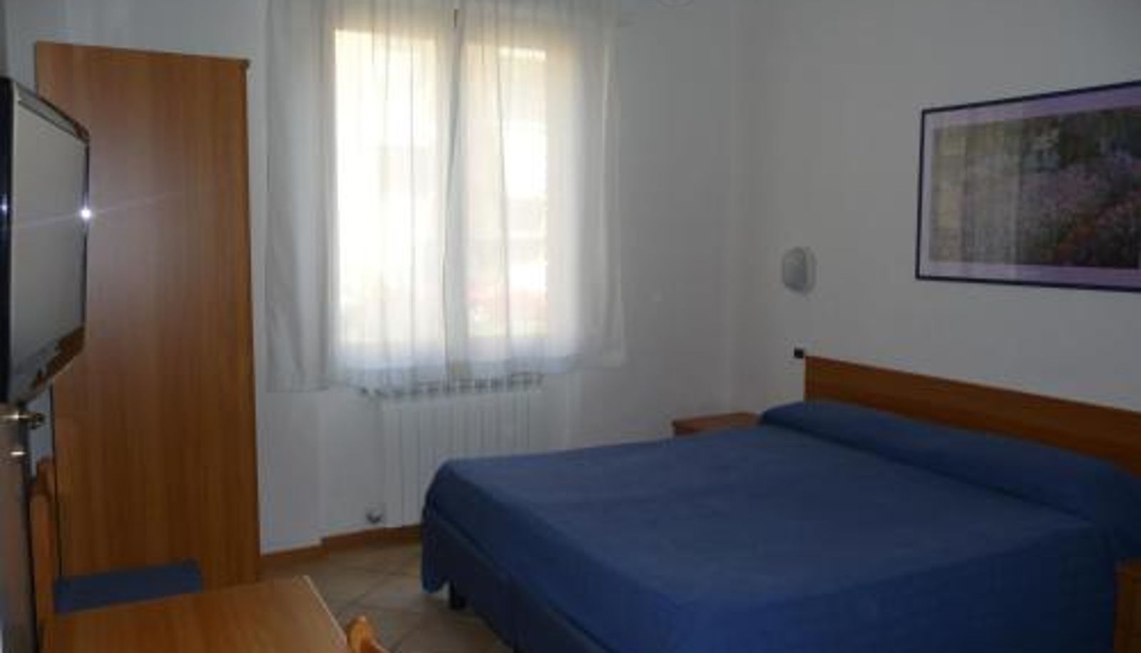 Dreibettzimmer - Hotel La Toscana
