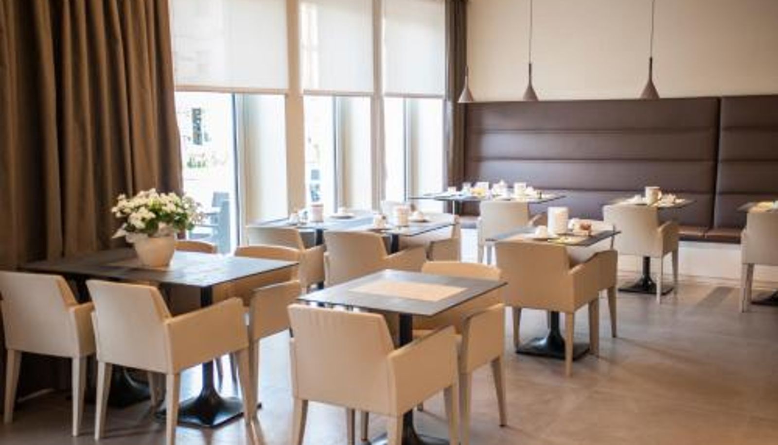 Ontbijtzaal in het restaurant - Hotel Metropole