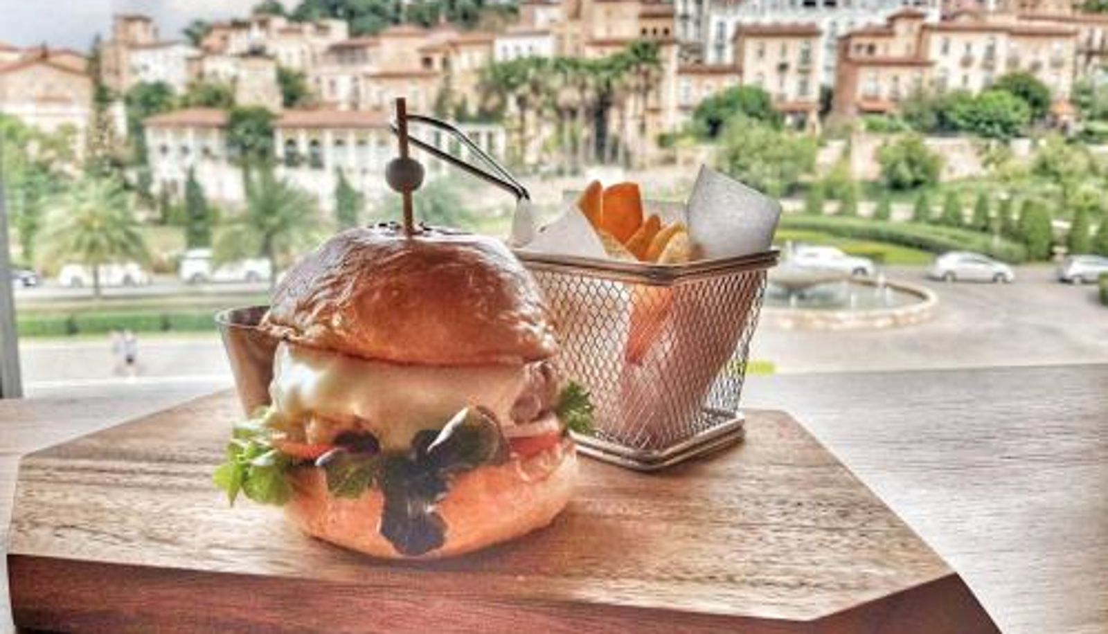 Salle de petit-déjeuner dans le restaurant - Toscana Piazza by Toscana Valley