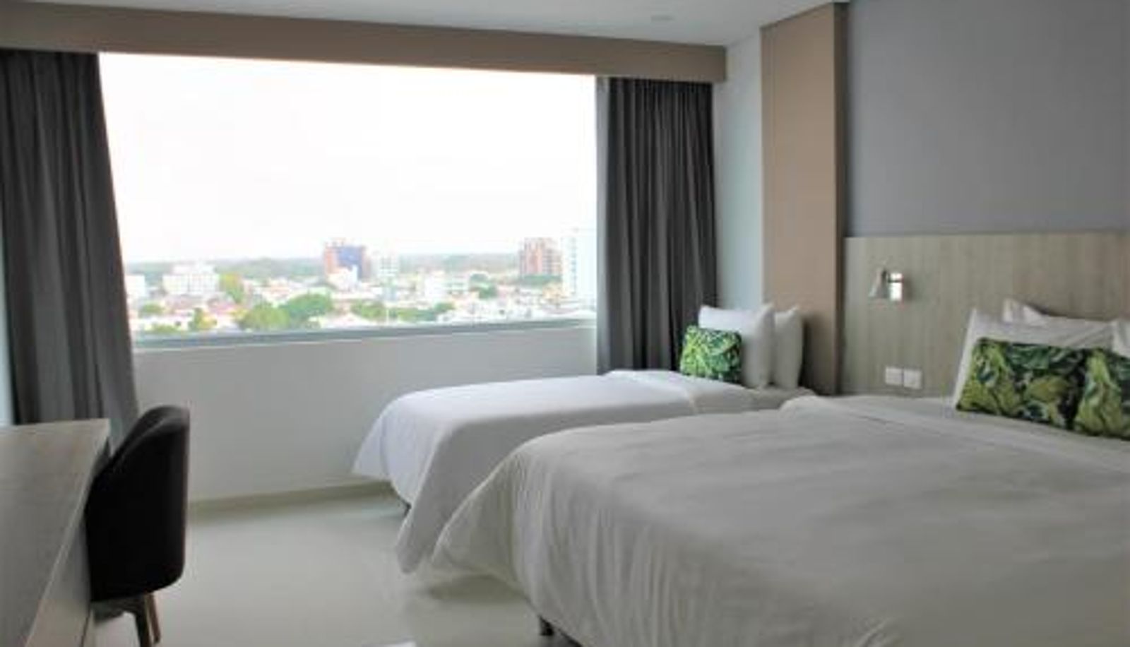 Tripla - Hotel Sexta Avenida Inn