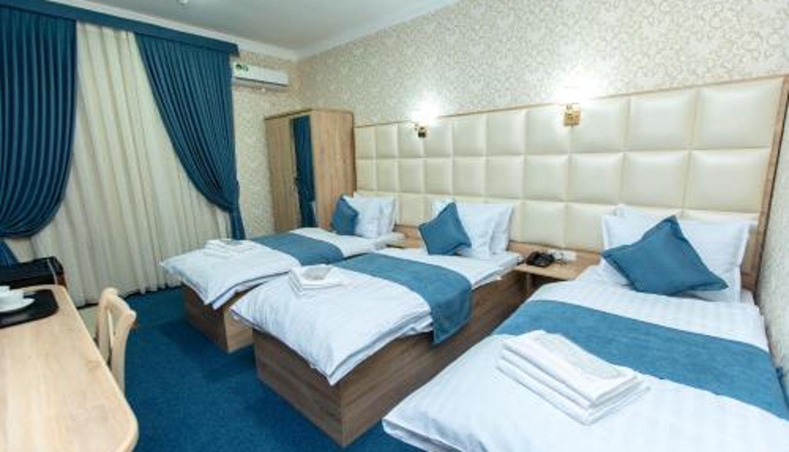 Dreibettzimmer - Mirzo Boutique Hotel