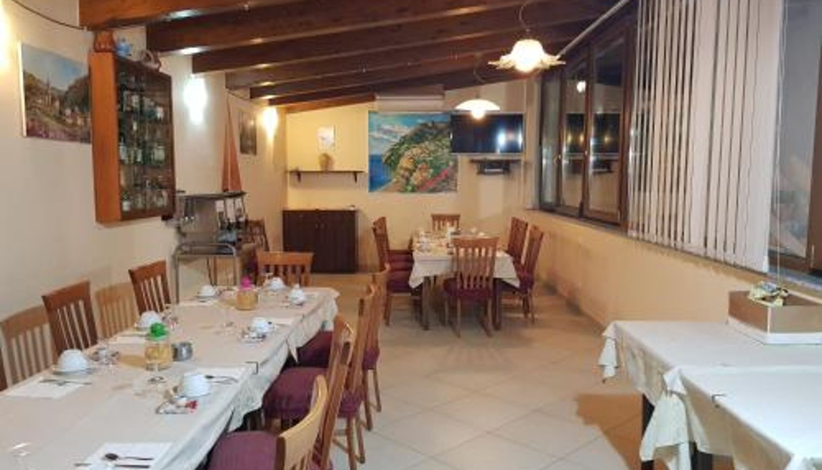 Sala de desayunos dentro del restaurante - Hotel Gentile