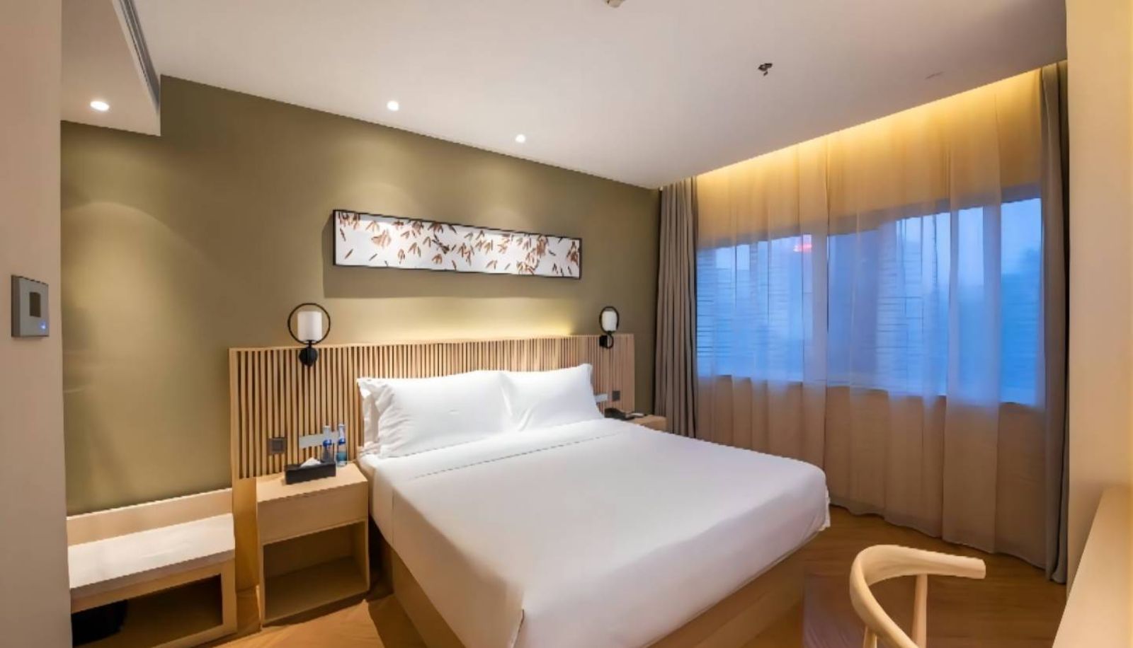 Zimmer - Urumqi  Changjiang Road Orange crystal CaoYe Hotel