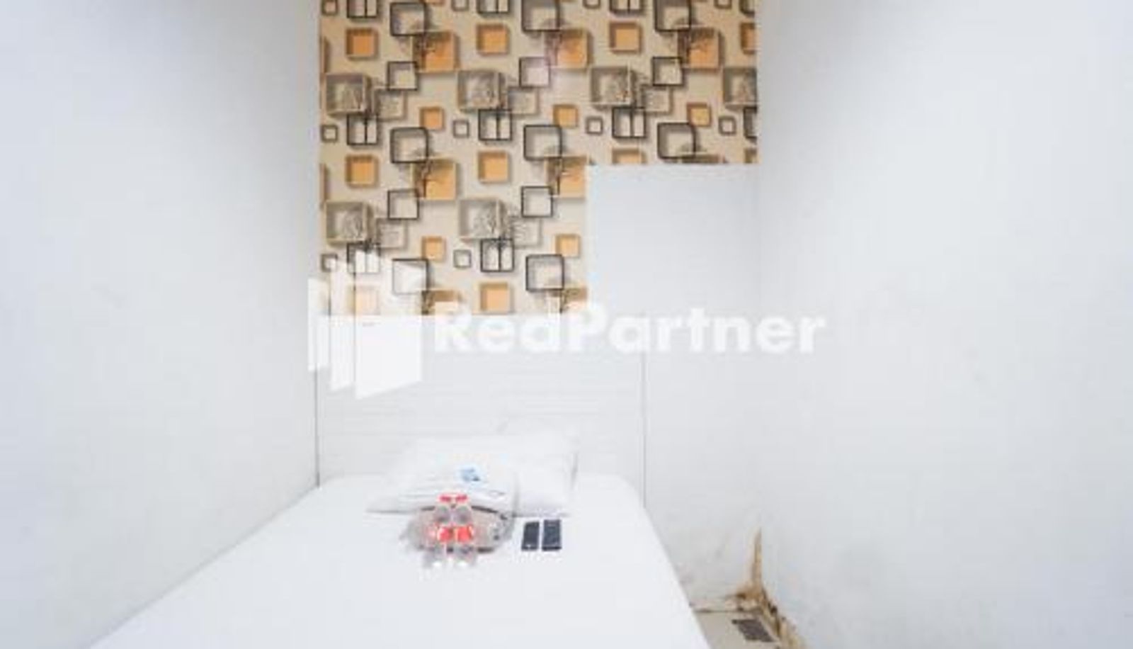 Room - Eascot Hotel Mitra RedDoorz