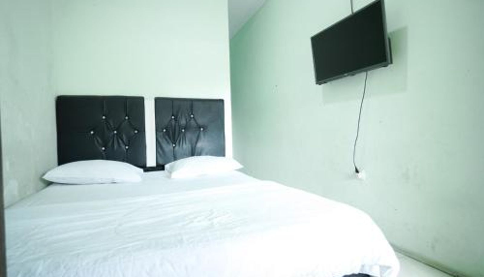 Habitación - Mahkota Sivali near Soekarno Hatta Airport Mitra RedDoorz