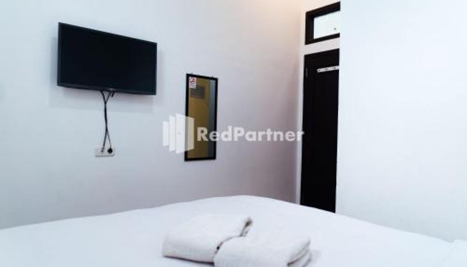 Kamer - Aksara Homestay Syariah Mitra RedDoorz